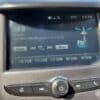 The 2018 Chevrolet Cruze LT Turbos radio display shows 94.9 FM playing Lightning Crashes by Live, with source options, a 4G LTE signal, 31°C temperature, and the time at 3:37 PM, all elegantly controlled by a central knob below the screen.