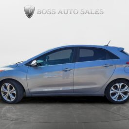 A 2014 Hyundai Elantra GT is parked in a parking lot. A 2014 Hyundai Elantra GT is parked in a parking lot.