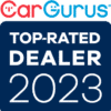 CarGurus Top-Rated Dealer 2023 badge with the CarGurus logo at the top. The text is on a dark blue background.