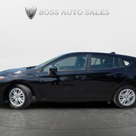 A 2017 Subaru Impreza Premium HB is parked indoors on a dark tile floor with a white background. The Boss Auto Sales logo and text appear above the car, which is shown in a side view.