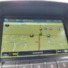 A 2017 Chevrolet Equinox 2LT AWD’s GPS screen shows a map with streets, points of interest, route navigation, 29°C temperature, time at 9:25 PM, and current road as Unnamed Rd with nearby labeled streets.