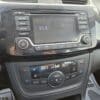 The 2018 Nissan Sentra SV features a digital dashboard screen set to 95.9 FM, alongside sleek temperature and airflow controls at 32.6°C. A stylish red start/stop button is on the left, showcasing functional elegance.